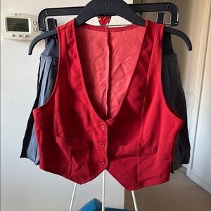 Gryffindor student costume red button down vest, pleated gray skort, and tie